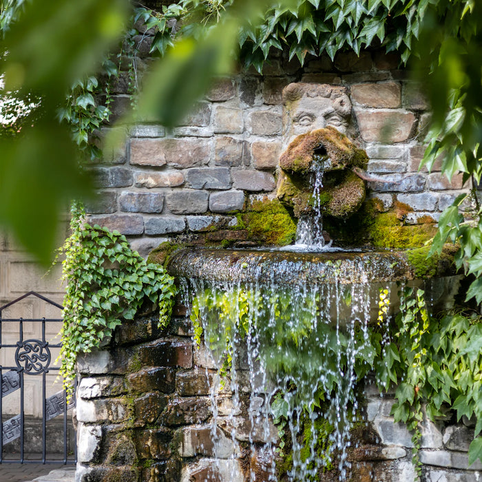 Stylish Solar and Cast Stone Wall Fountains for Outdoor Charm