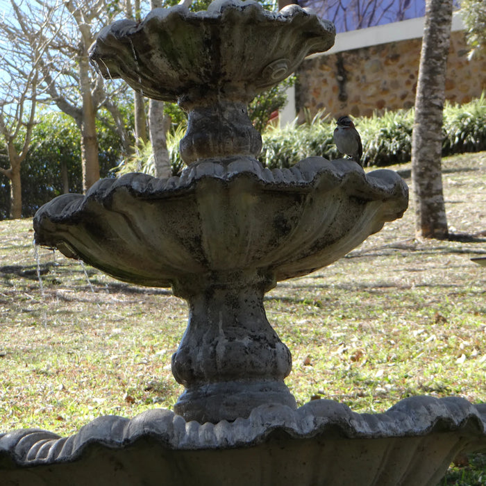 Elevate Your Outdoor Space with Wood and Stone Fountains