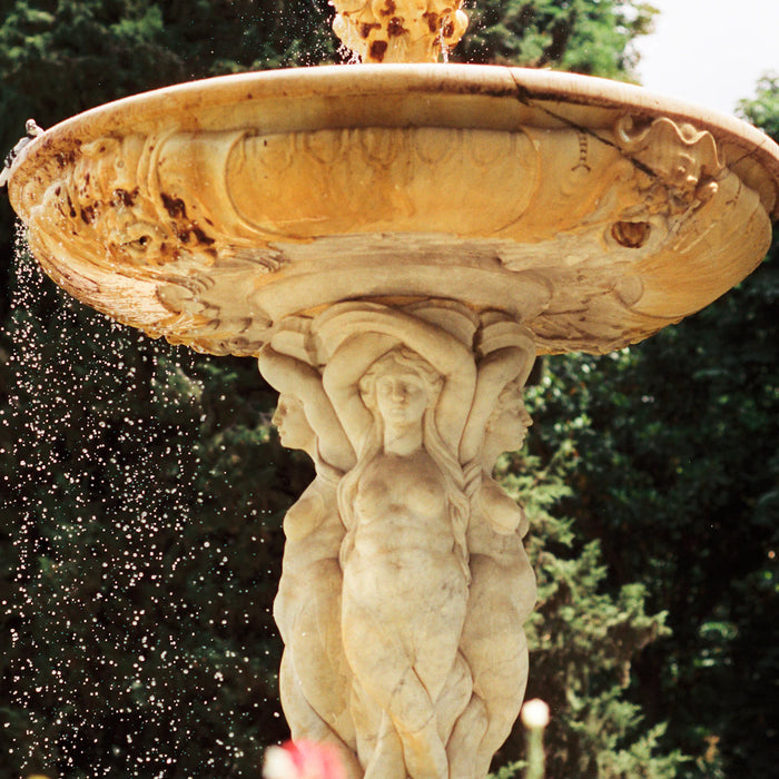 Elegant Cast Stone Wall Fountains for Timeless Outdoor Charm