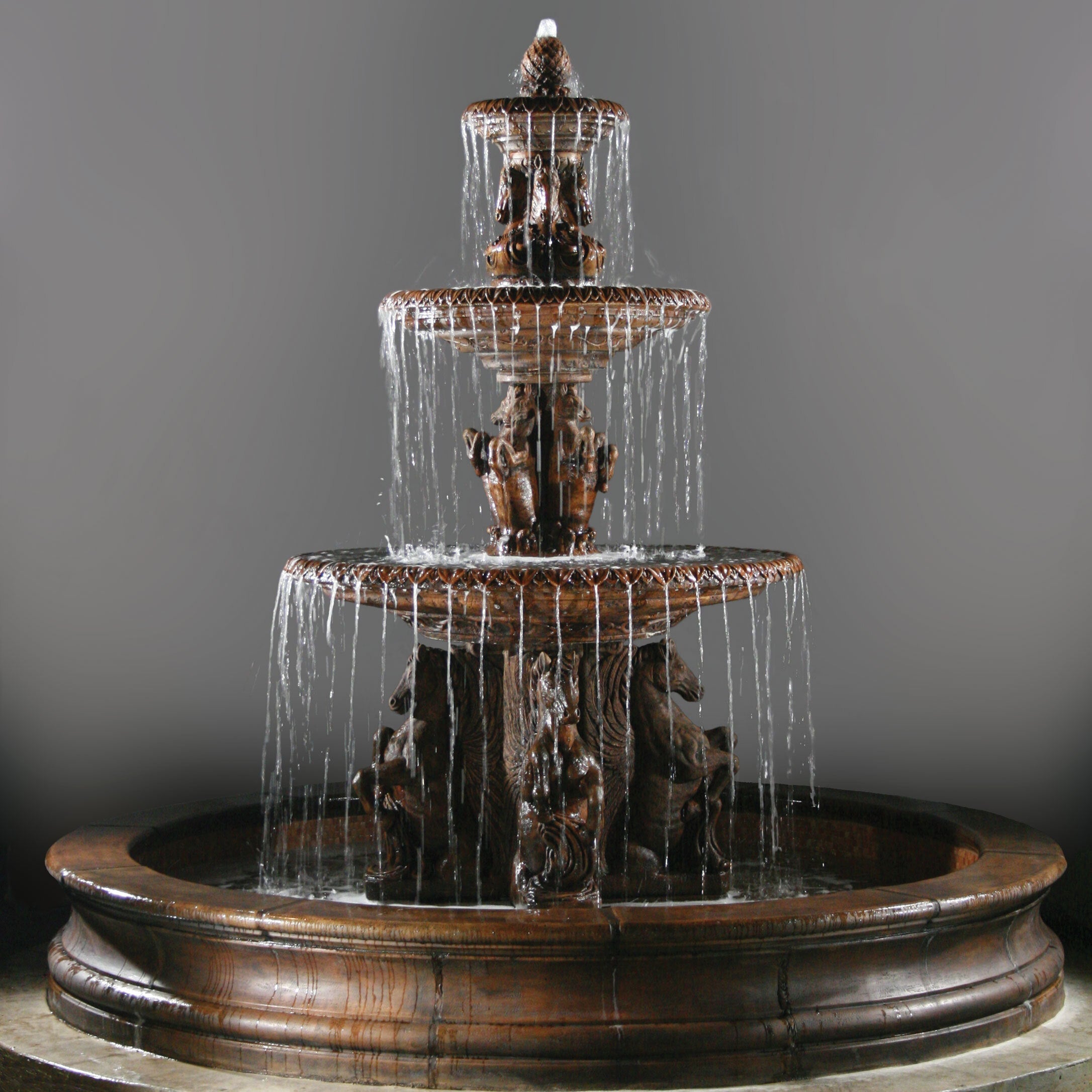 Fiore Stone Cavalli 3 Tier Fountain with 12 ft. Bracci Basin 2133-F12 in Cast Stone 2133-F12